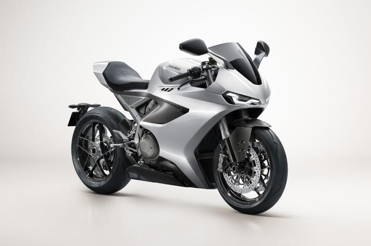 The Manx R is essentially a replacement for the erstwhile V4SV Norton Manx R front three quarter shot
